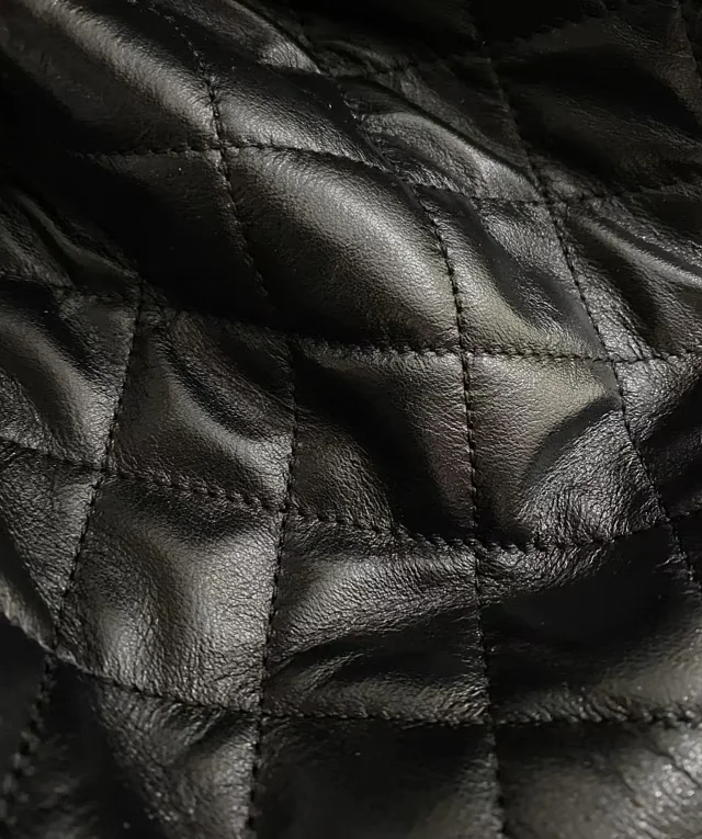The stitching utilizes high-end thread that matches the original.